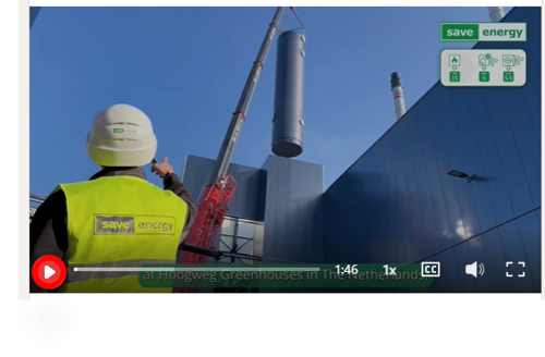 Summit_SAVE ENERGY - man with viz vest looking at flue gas of a biomass boiler